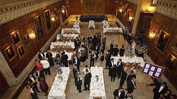 Guests mingling at a formal event.