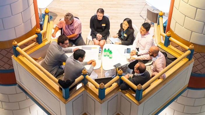 A diverse group of MBA students collaborate on the Global Consulting Project.