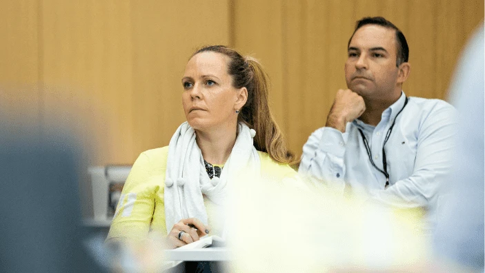 Participants listening attentively during an Executive Education session.