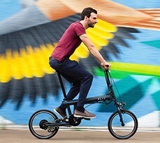 Dave Henderson, FLIT Technical lead, riding a FLIT bike.