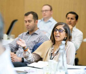 Delegate answering questions in class.