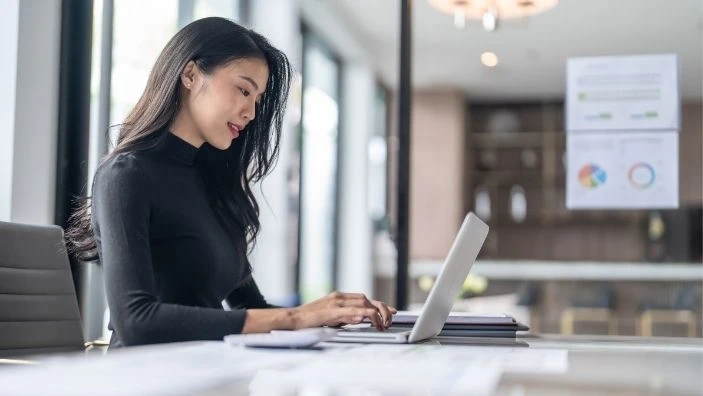 Woman completing an online survey.