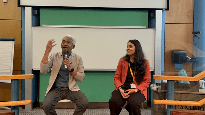 Aaryani Dogra conducting a talk in the lecture theatre.