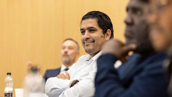 Participant listening attentively during an Executive Education session.
