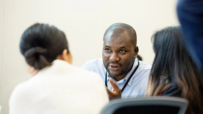 Participants engaging in discussion during an Executive Education session.