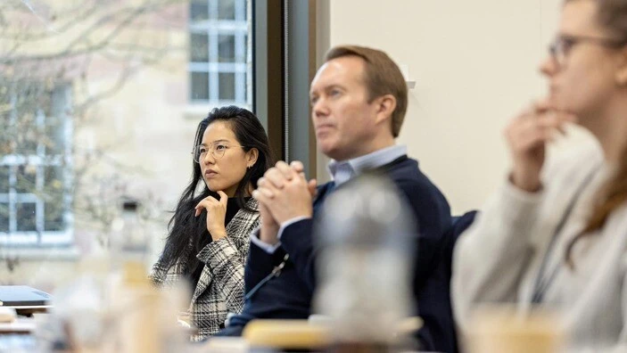 Executive education participants listening attentively.