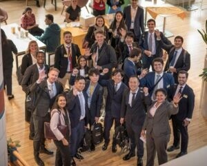 MBA students standing in the common area