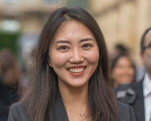 Cambridge MBA student smiling.