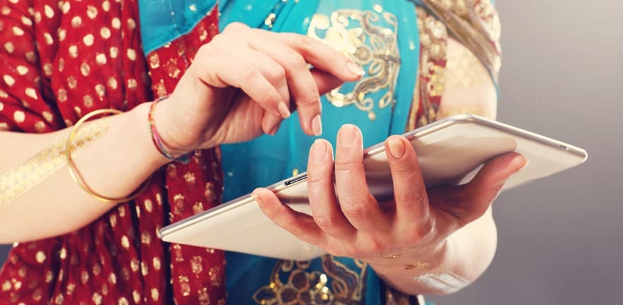 Arabic woman using tablet