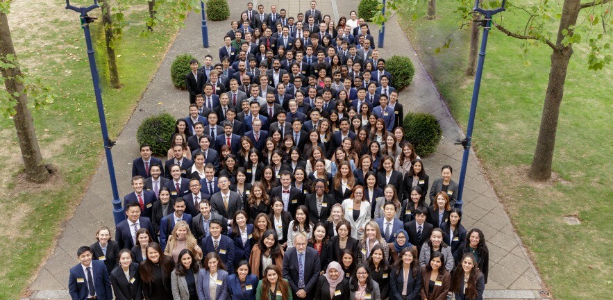 large class group outside building.
