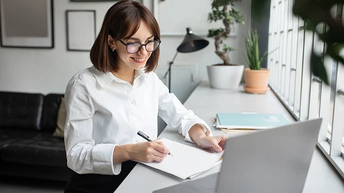 Woman taking online course.