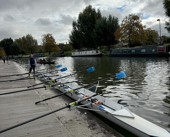 MFin students rowing on the River Cam.
