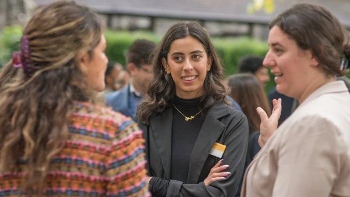 Cambridge MBA students in conversation.