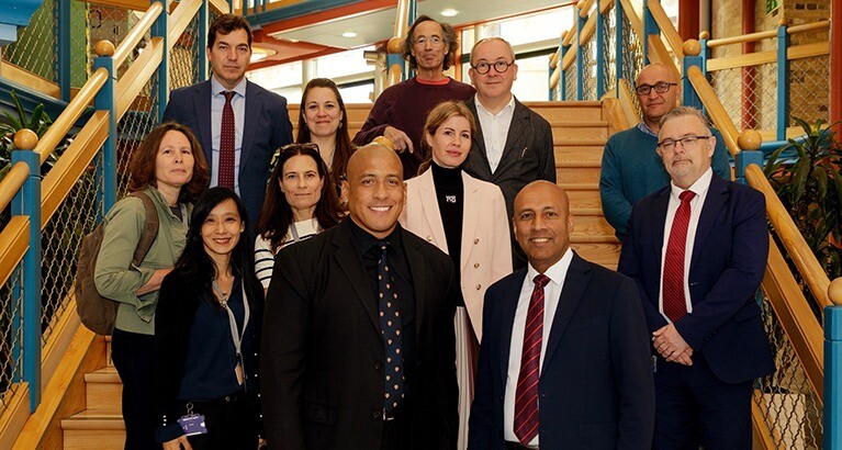 Tony Nicholson with the Dean and staff of Cambridge Judge.