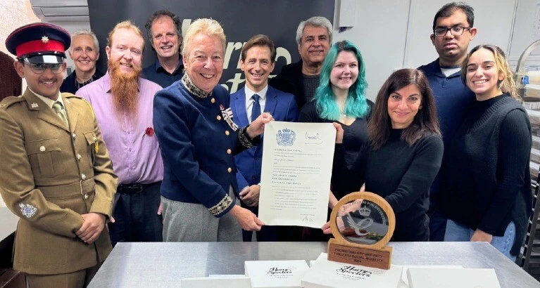 The Harry Specters team receive their award.