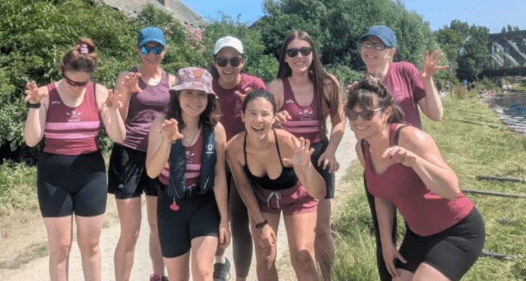 Peiju Li rowing at her College.