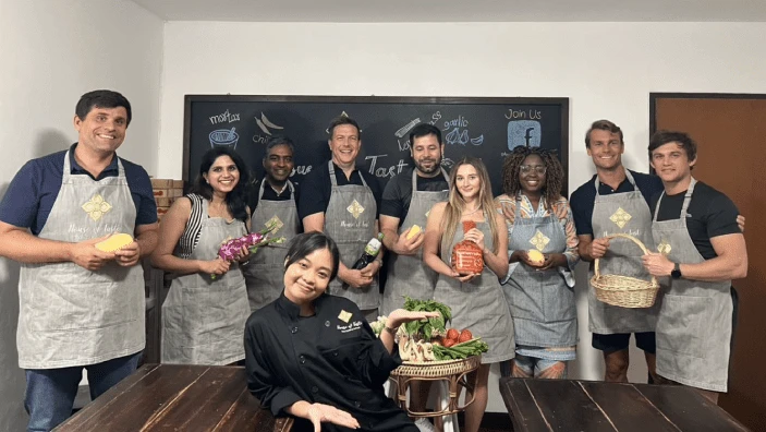 Kamiar Mohaddes joining a hands-on Thai cooking class in the heart of Bangkok.