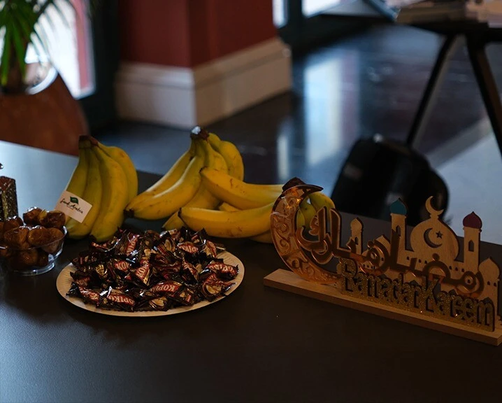 Dates, bananas and a Ramadan Kareem sign.
