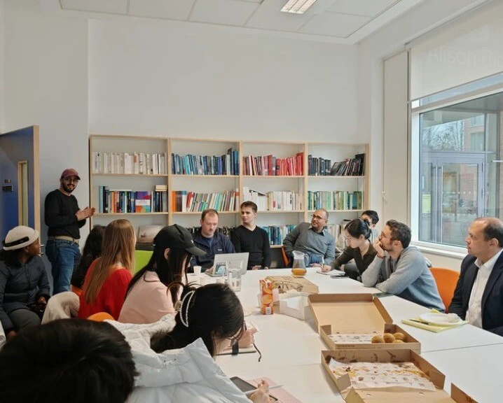 A group attending a climaTRACES event in a seminar room.