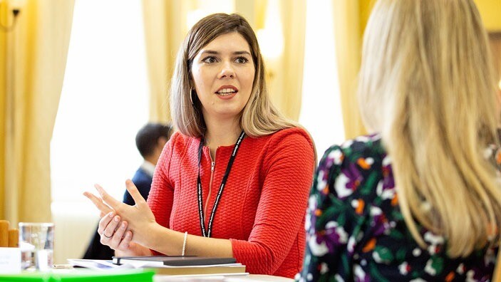 Participants engaging in discussion during an Executive Education session.