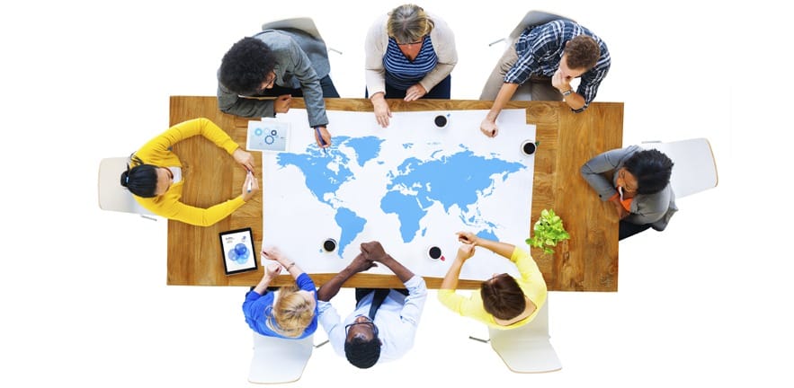 Group of Business People Meeting with World Map