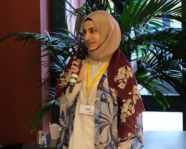 Student speaking at the Ramadan event.