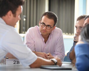 Cambridge Executive MBA students working.