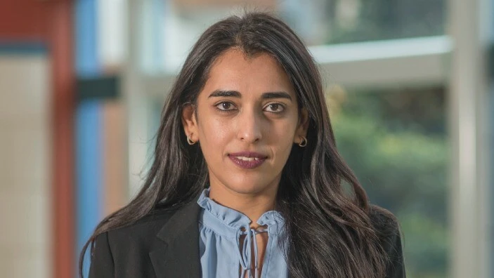 Nageen Qasim inside the Cambridge Judge Business School Atrium