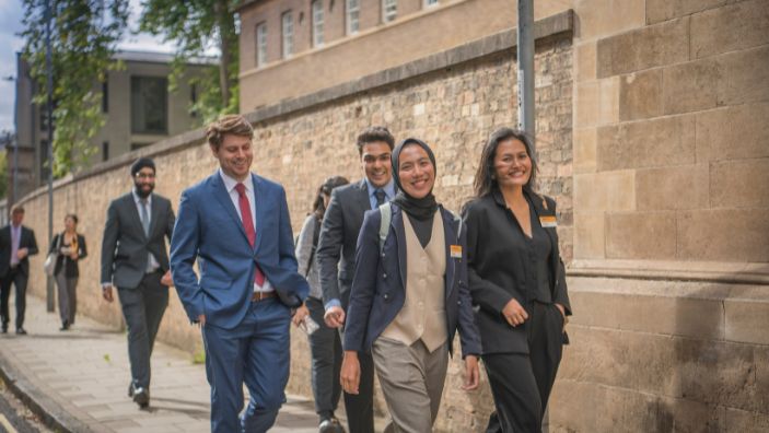 MBA students walking along the street