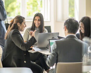 MBA students working on a team project.