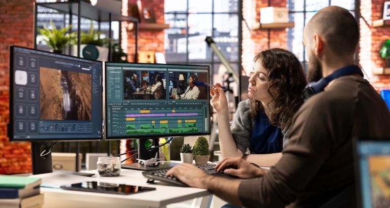Creative team of editors using AI to collaborating on a video project.
