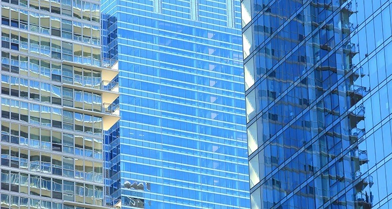 Reflective glass of city office buildings.