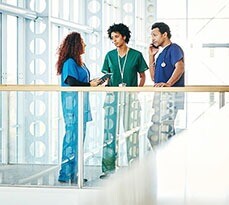 Healthcare professionals in a modern hospital setting.