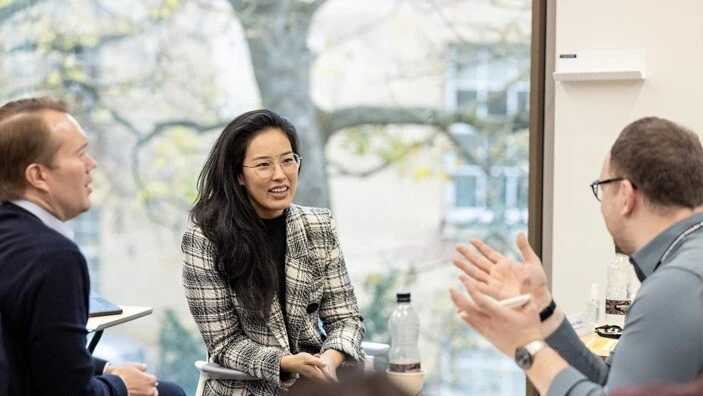 Participants engaging in discussion during an Executive Education session.