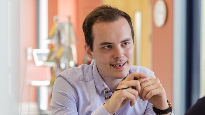 A scholar engaged in discussion.