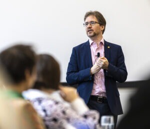 Professor David Stillwell stood at the front of a classroom teaching.