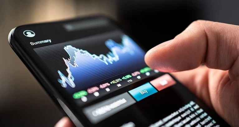 Stock market trading on a mobile phone.