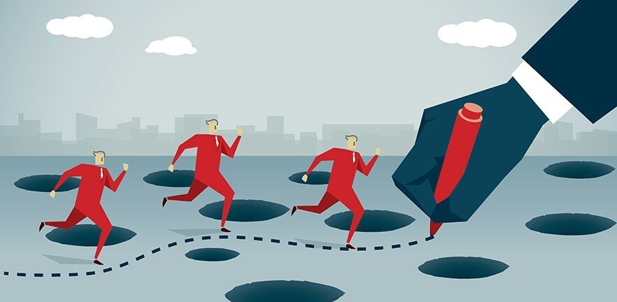 Figures trying to find a path through the traps.