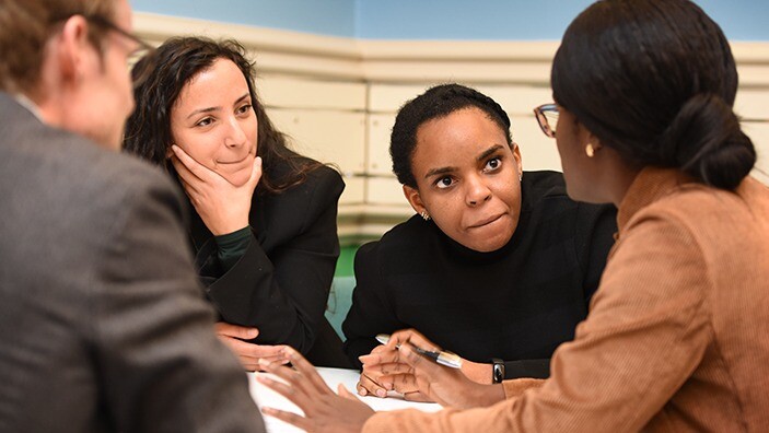 Executive MBA student group in class, in Cambridge.