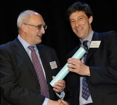 Dr Simon Leamount accepts the Pilkington Prize from the Vice-Chancellor