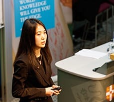 Irina Kim, EMBA alumna talking as part of the MFin City Speaker Series