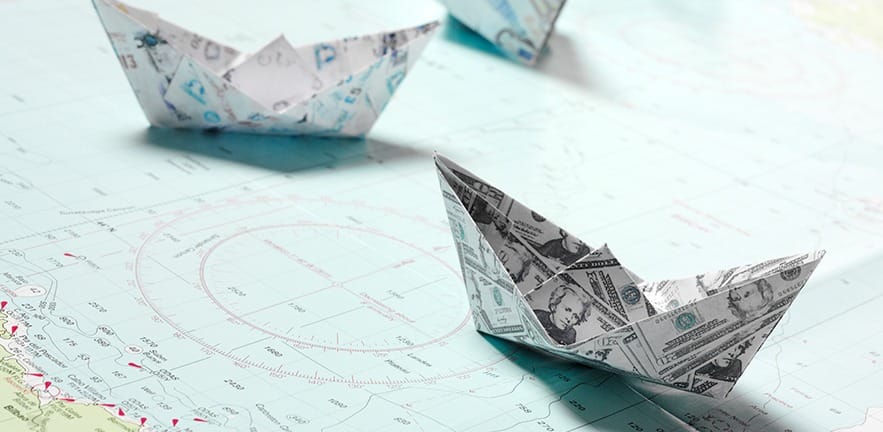 Currency origami boats 