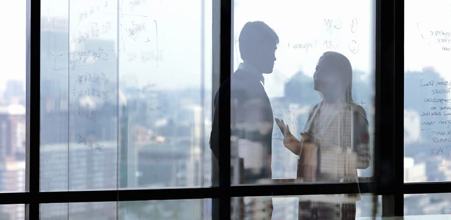 Silhouette shadows of business people talking in office