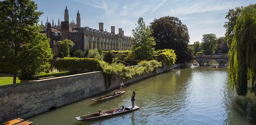 Punting along the river Cam in the sunshine.