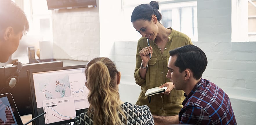 Shot of a group of colleagues having an informal meeting in a modern office