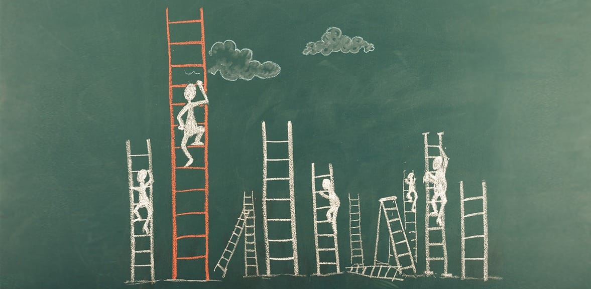 chalkboard drawing of some men climbing a ladder. The drawing shows a flat field where multiple ladders are stacked up towards the sky. The men are outlined in white. The red ladder is the tallest. The other ladders are white. There are two clouds above the ladders.