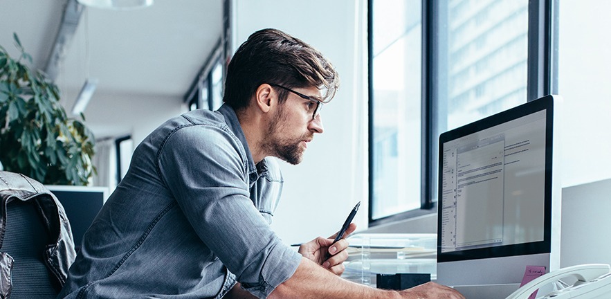 A manager reading an email.