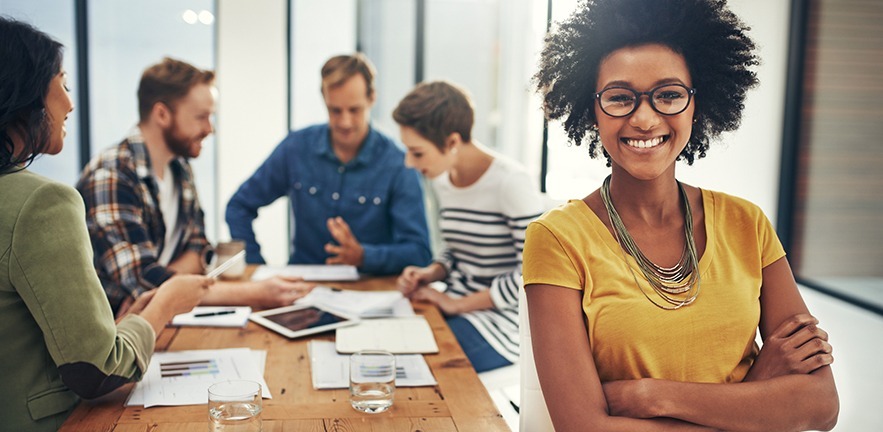 Portrait of an attractive young businesswoman sitting in the boardroom during a meeting