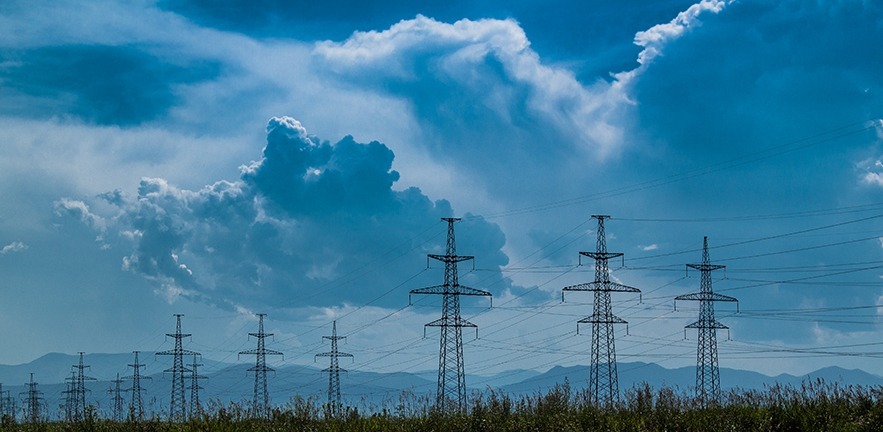 Electrical powers line against the sky.