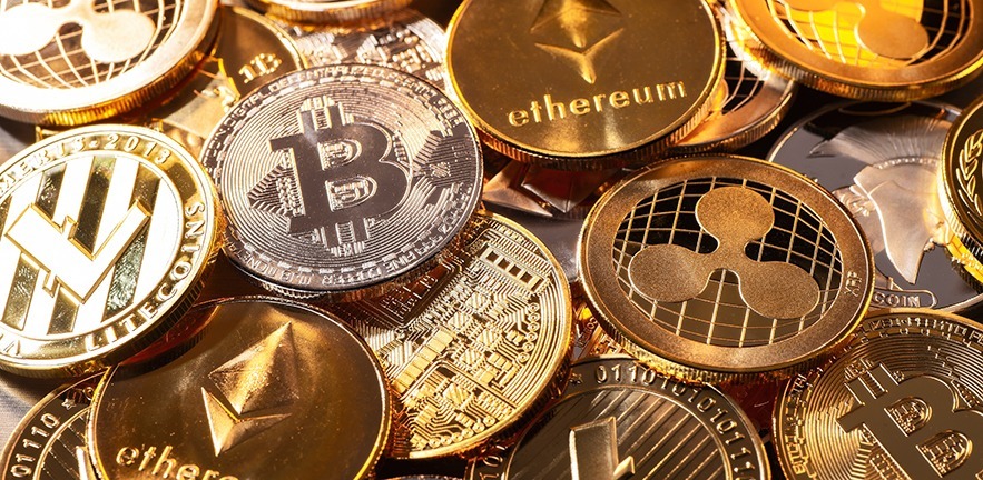 Coins of various cryptocurrencies.